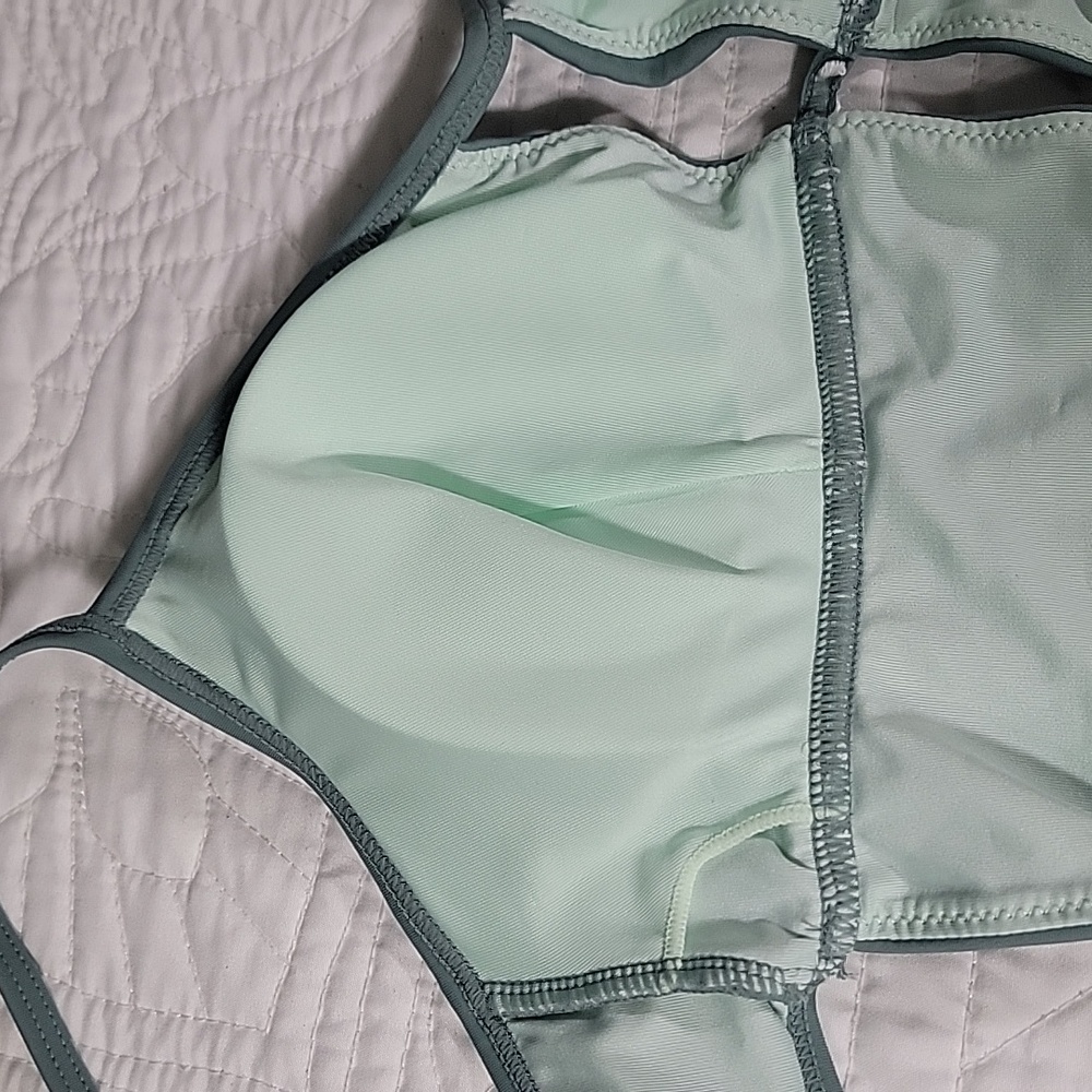 Women's Green One Piece Swimsuit with Unique Cutouts and Structured Bustier - Picture 4 of 11